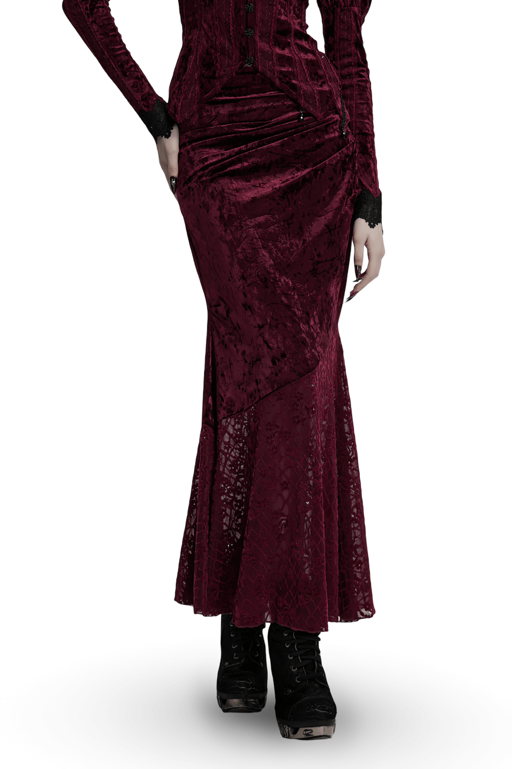 Gothic velvet lace asymmetrical skirt with fishtail design and elegant silhouette worn with stylish boots.