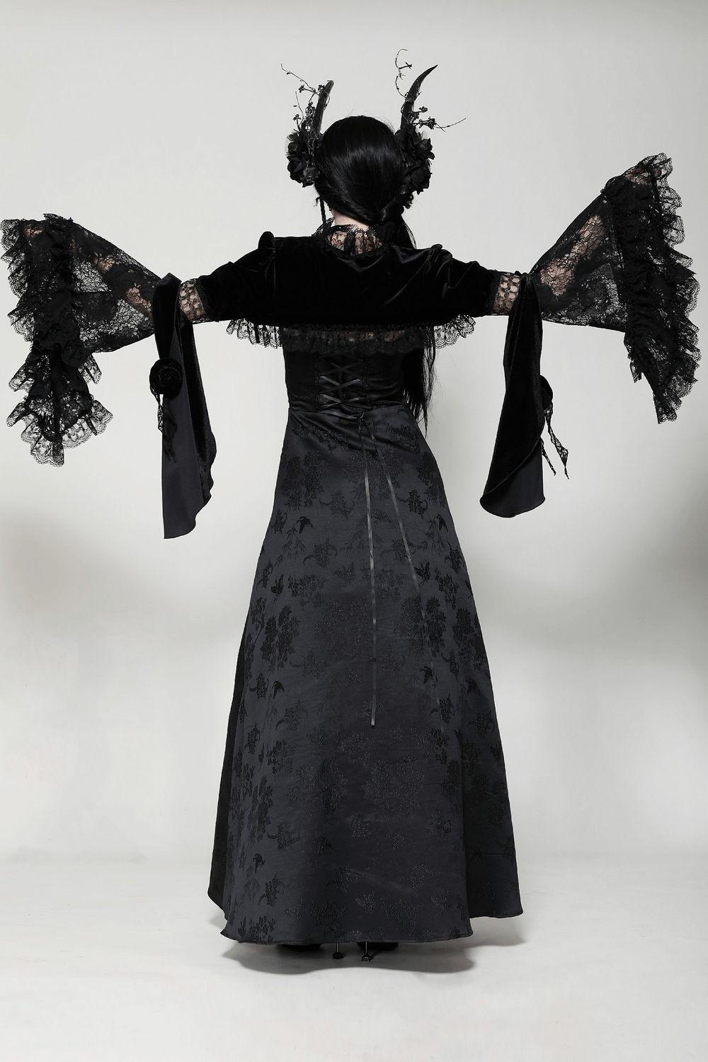 Gothic velvet lace bolero with flared sleeves and intricate details, perfect for adding dramatic flair to elegant outfits.