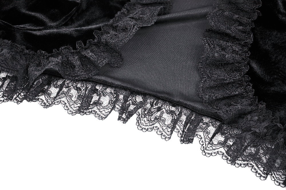 Close-up of lace trim on Gothic velvet bolero showcasing intricate floral lace and luxurious velvet details.