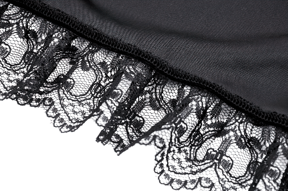 Close-up of black floral lace trim on Gothic velvet bolero sleeve, showcasing intricate detailing and dark elegance.