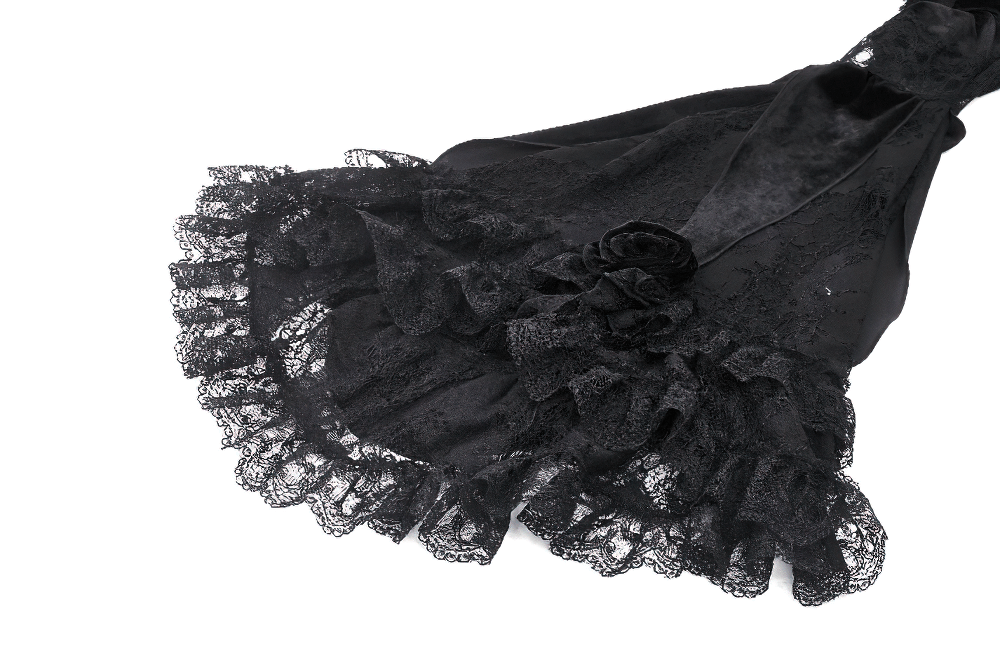 Gothic velvet lace bolero with flared sleeves and floral rosette detailing, showcasing elegant dark fashion and romantic style.