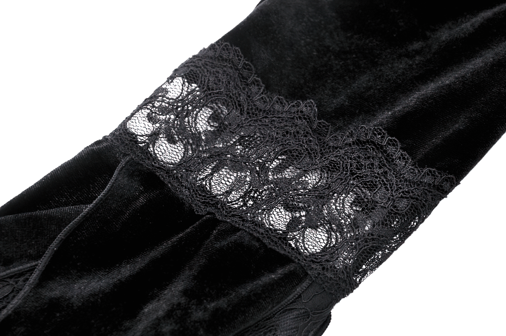 Close-up of gothic velvet fabric with elegant black lace trim, perfect for adding a dramatic flair to any outfit.