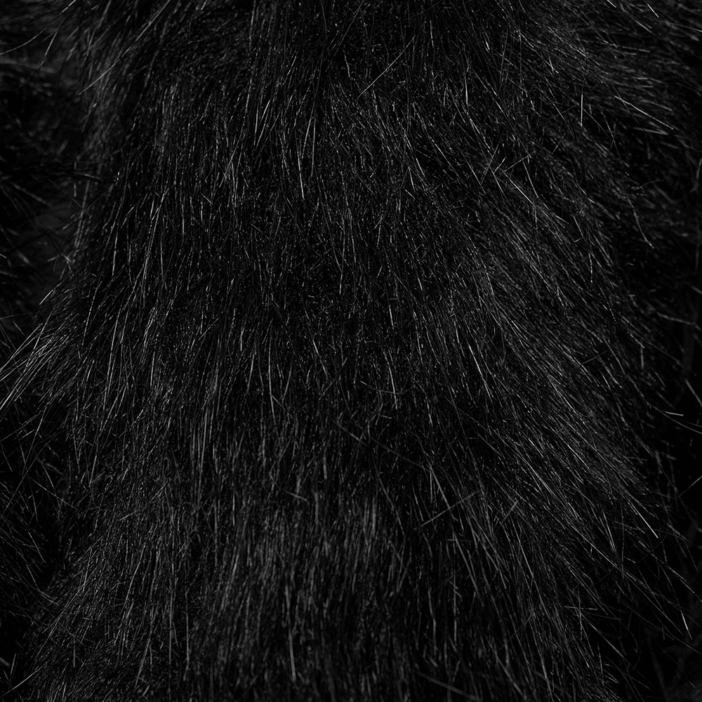 Close-up of luxurious black faux fur fabric with a rich, textured finish, perfect for Gothic-inspired fashion.