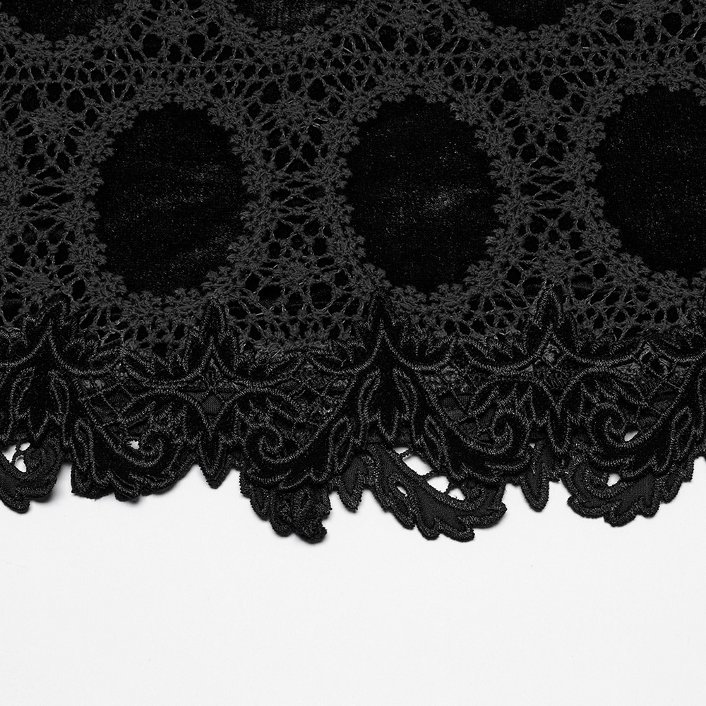 Close-up of intricate black lace trim featuring floral patterns, perfect for gothic velvet mini skirts.