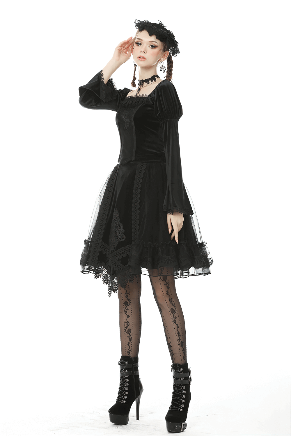 Model showcasing a Gothic velvet lace skirt with mesh overlay and ribbon accents for a Victorian-inspired look.