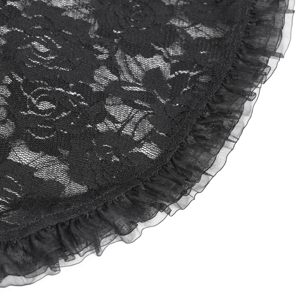 Close-up of black sheer lace with floral pattern and ruffled edges, perfect for gothic fashion accessories.