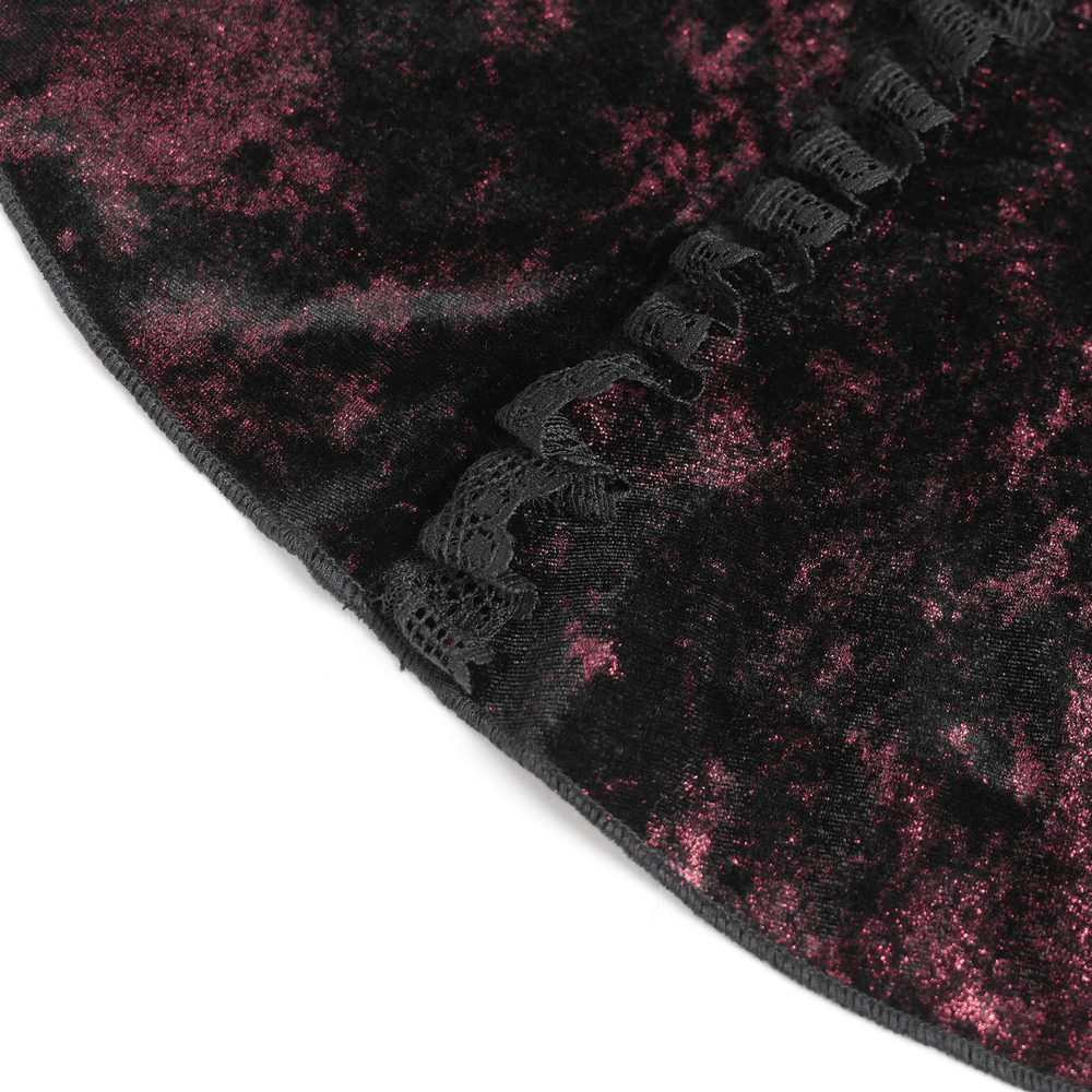 Close-up of gothic velvet top showing rich black and burgundy fabric with elegant lace detailing and ornate buttons.