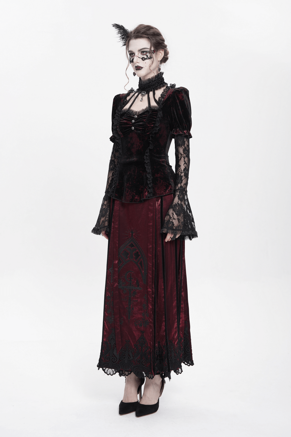 Gothic velvet lace sleeved top with Victorian flair, paired with a dramatic long skirt, showcasing dark elegance.