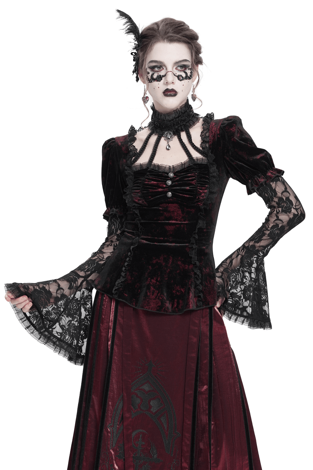 Gothic velvet top with sheer lace sleeves and Victorian details, perfect for alternative fashion lovers.