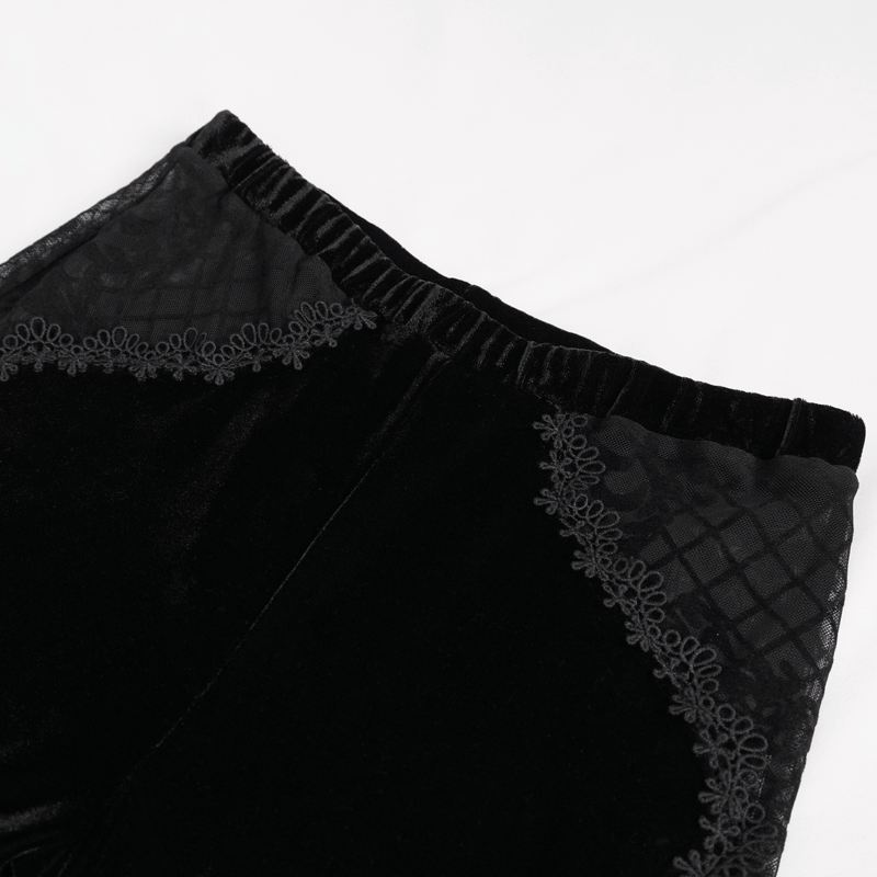 Gothic flared trousers with lace applique and velvet texture in elegant black, showcasing stylish lace-up sides.