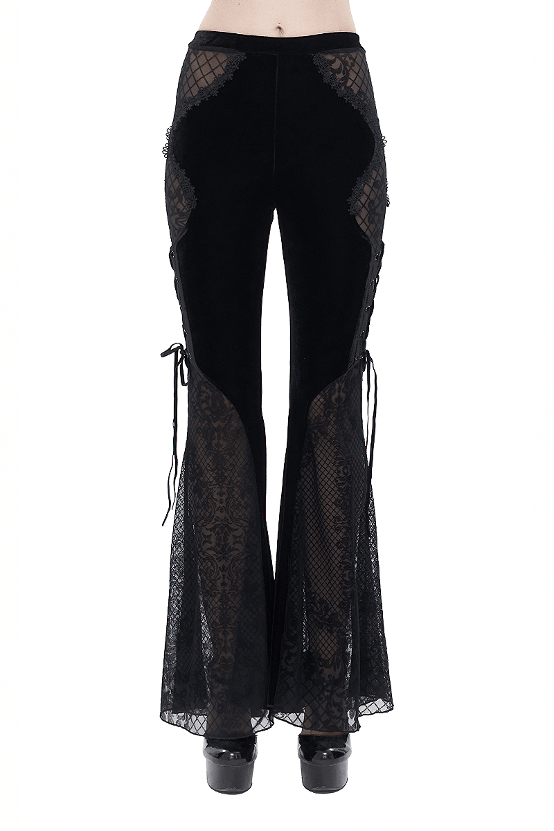 Gothic black velvet flared trousers with lace panels and side lacing, perfect for an elegant gothic look.