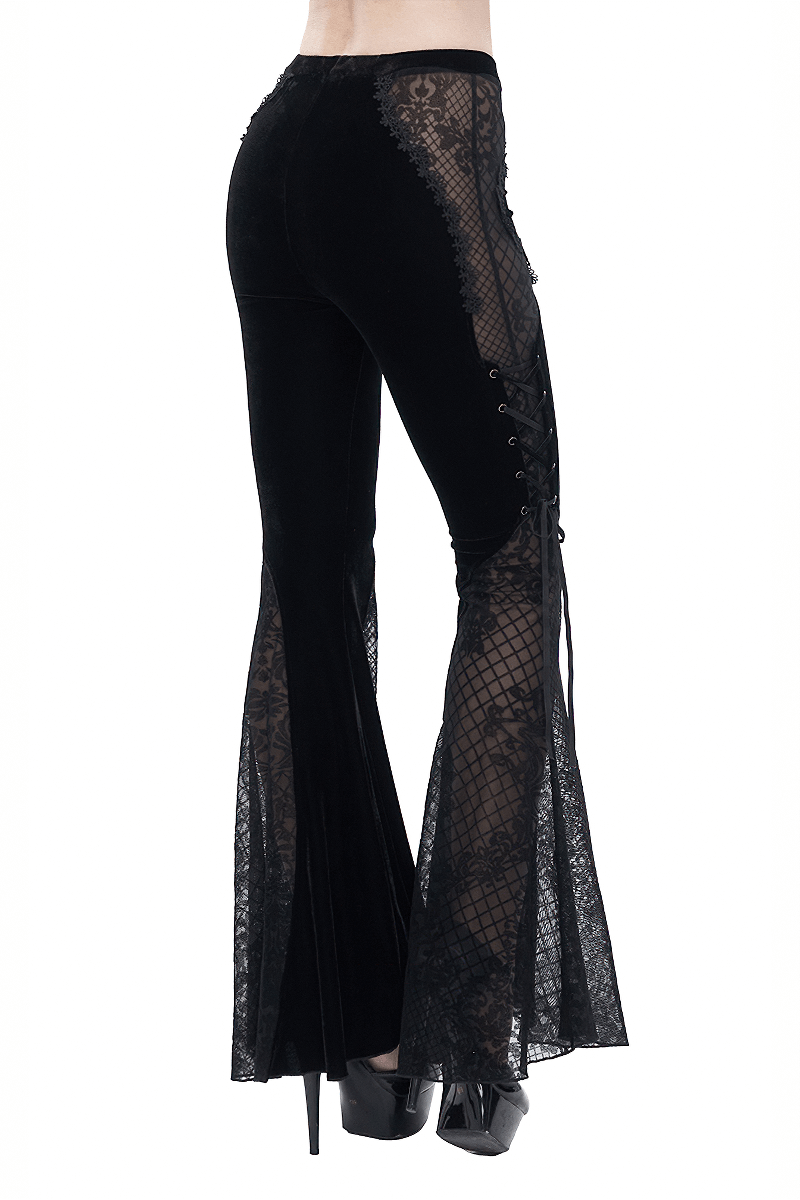 Elegant black velvet flared trousers with lace panels and side lace-up detailing, perfect for gothic style enthusiasts.