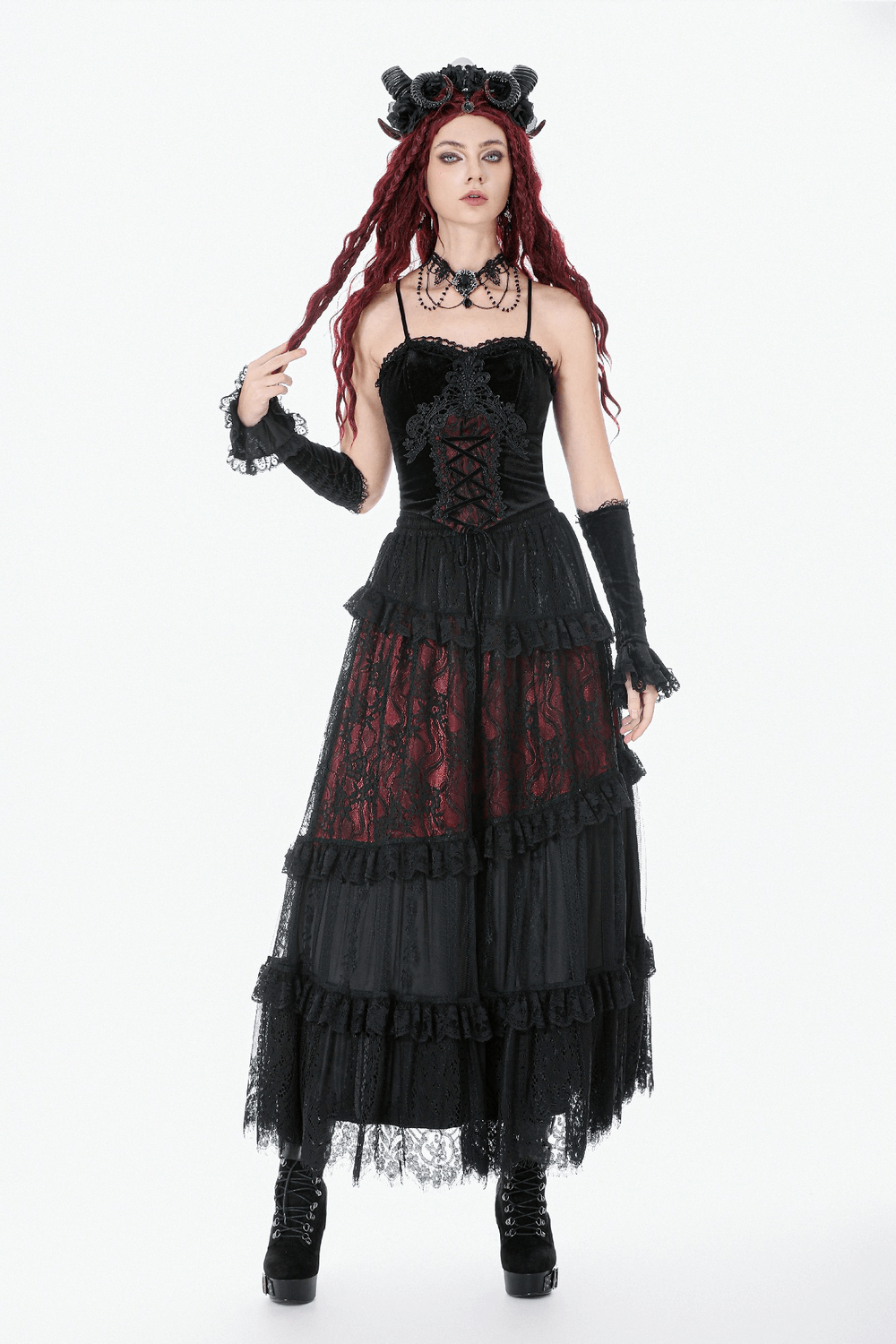 Gothic Velvet Lace-Up Corset Top with Sheer Detailing worn by a model, showcasing intricate lace and a dramatic look.