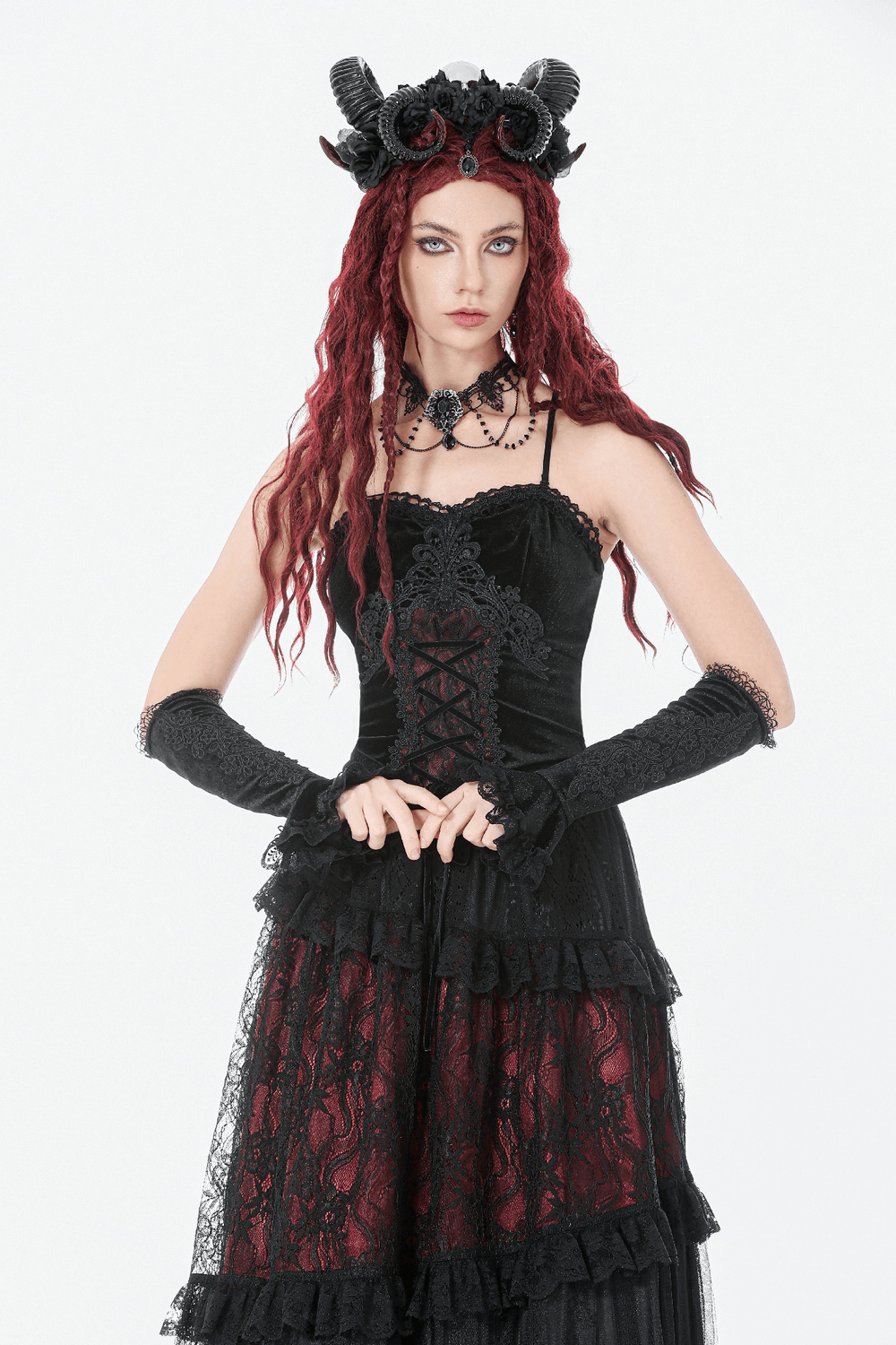 Gothic Velvet Lace-Up Corset Top with Sheer Detailing modeled by a model with red hair and black accessories.