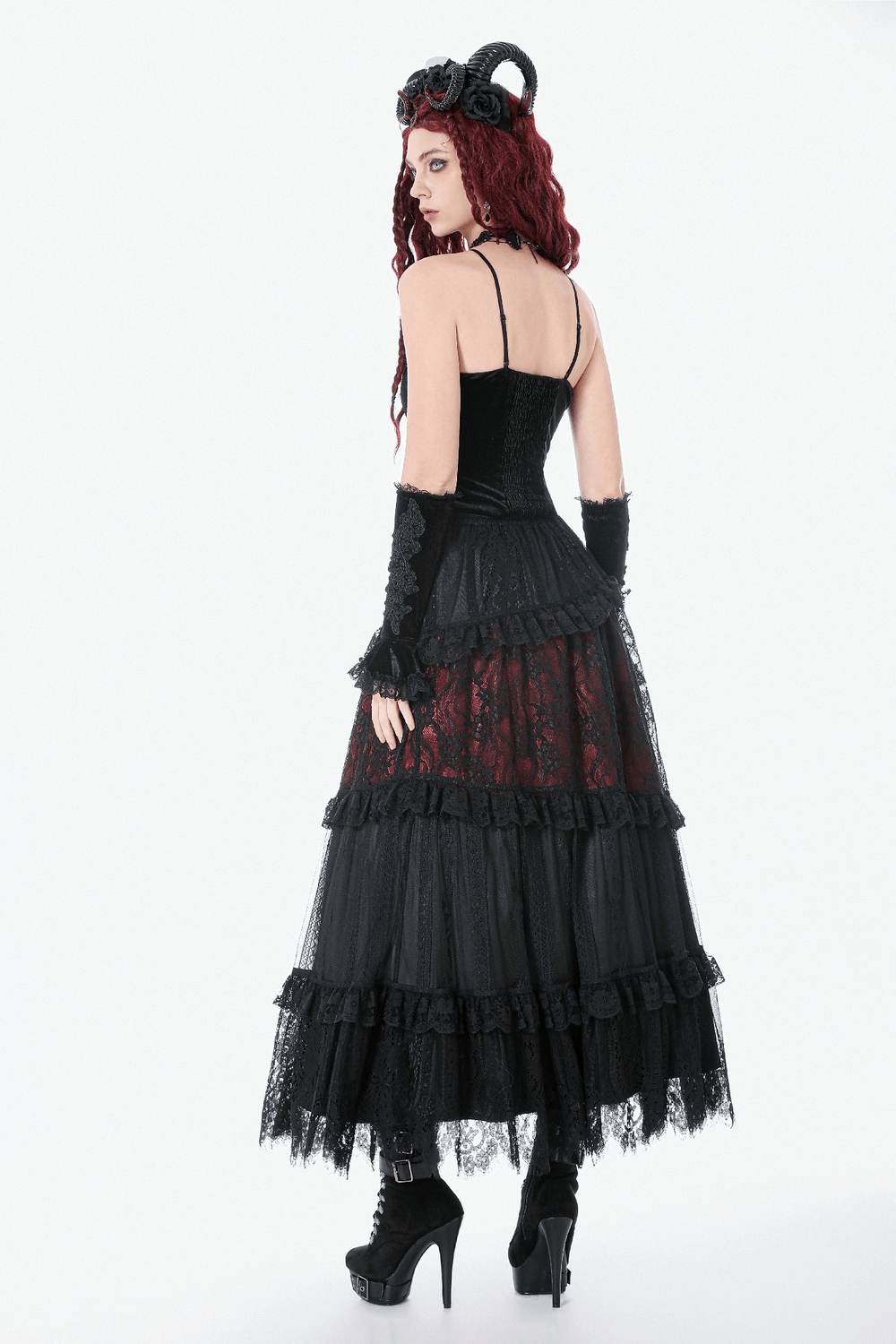 Gothic Velvet Lace-Up Corset Top with Sheer Detailing showcased in a full gothic outfit featuring a layered black skirt.