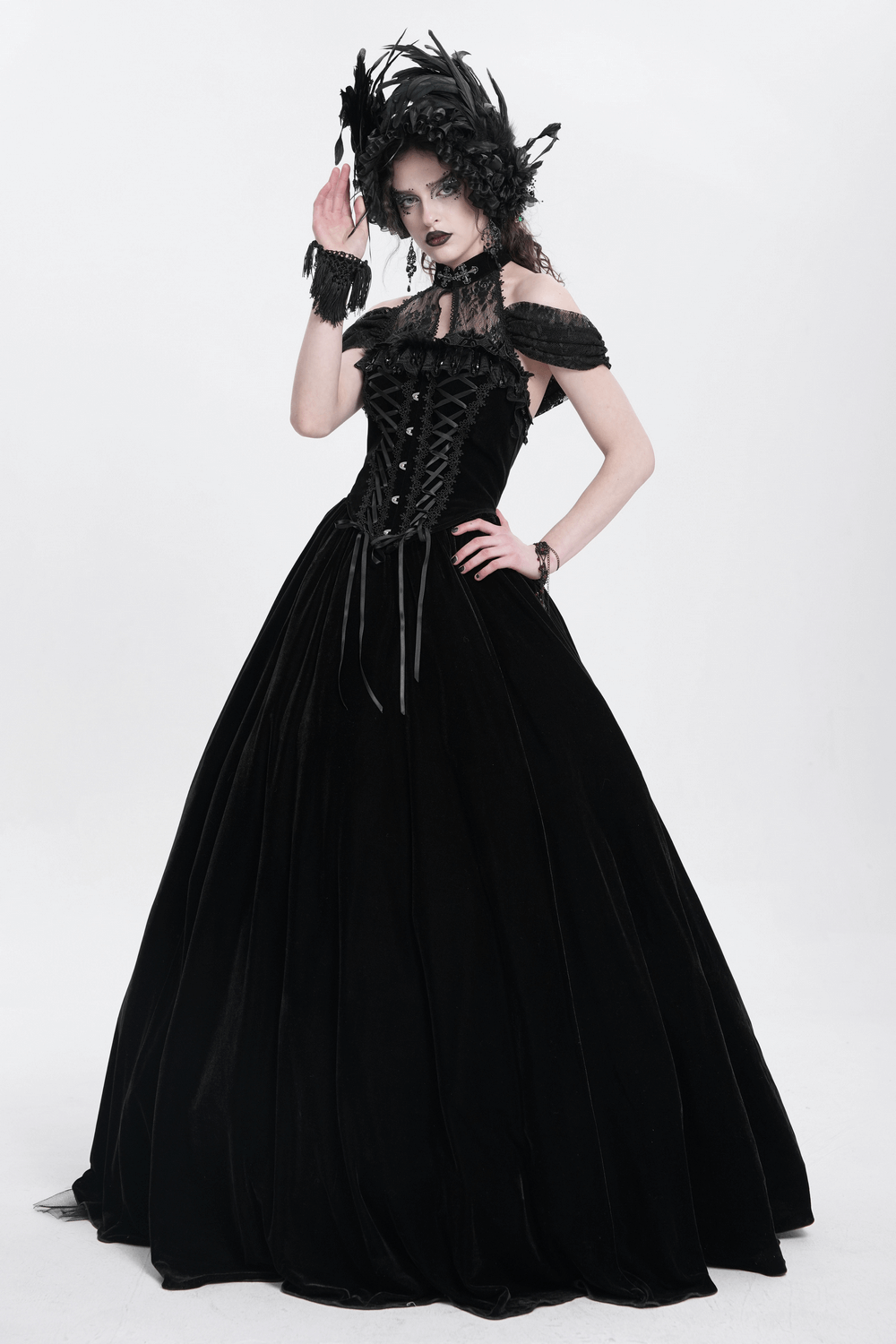 Gothic black velvet lace-up maxi dress with off-shoulder design and elegant lace detailing.