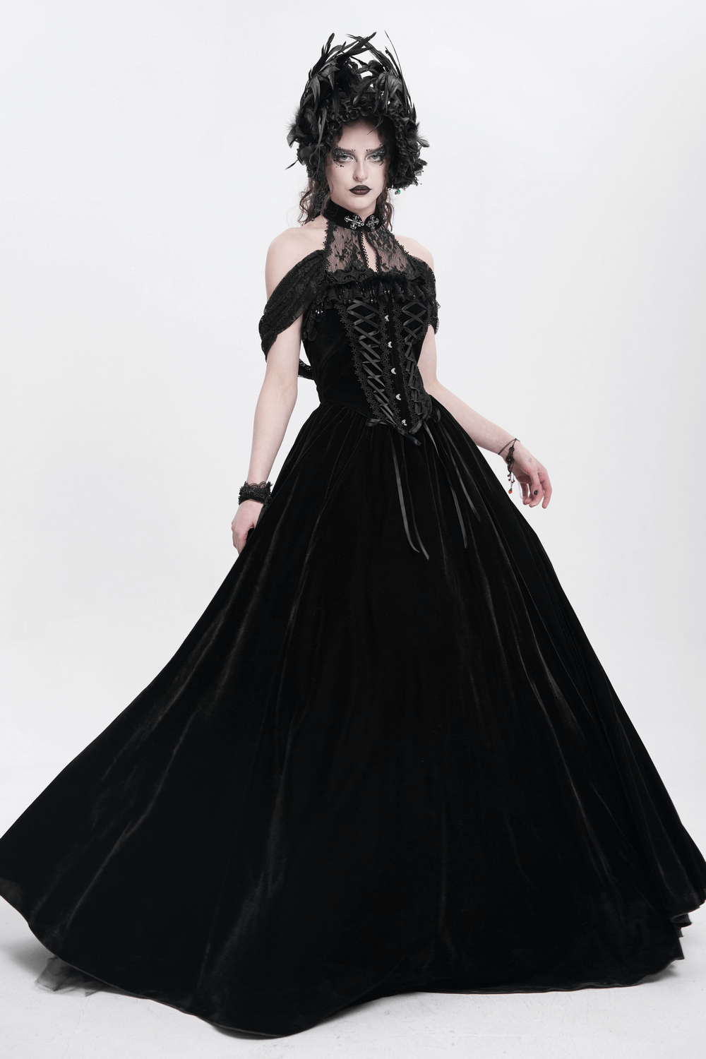 Gothic velvet lace-up maxi dress with off-shoulder design, featuring elegant lace accents and a flowing skirt.
