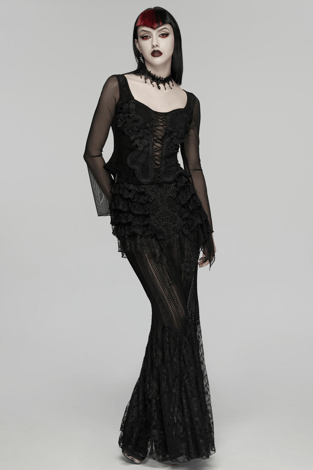 Alt Tag: Gothic Velvet Lace-Up Mesh Embroidery Top For Women on model, black sheer lace long-sleeve gothic outfit with embroidery details