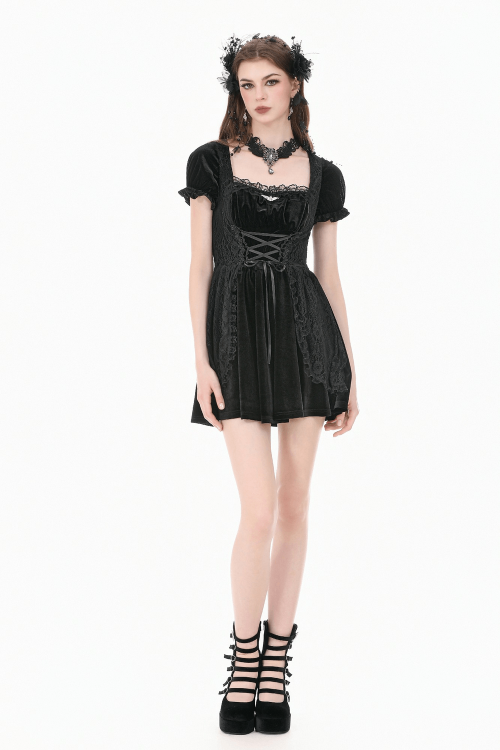 Gothic Velvet Lace Up Puff Sleeve Mini Dress for Women in black with lace detail and puff sleeves, styled with platform boots.