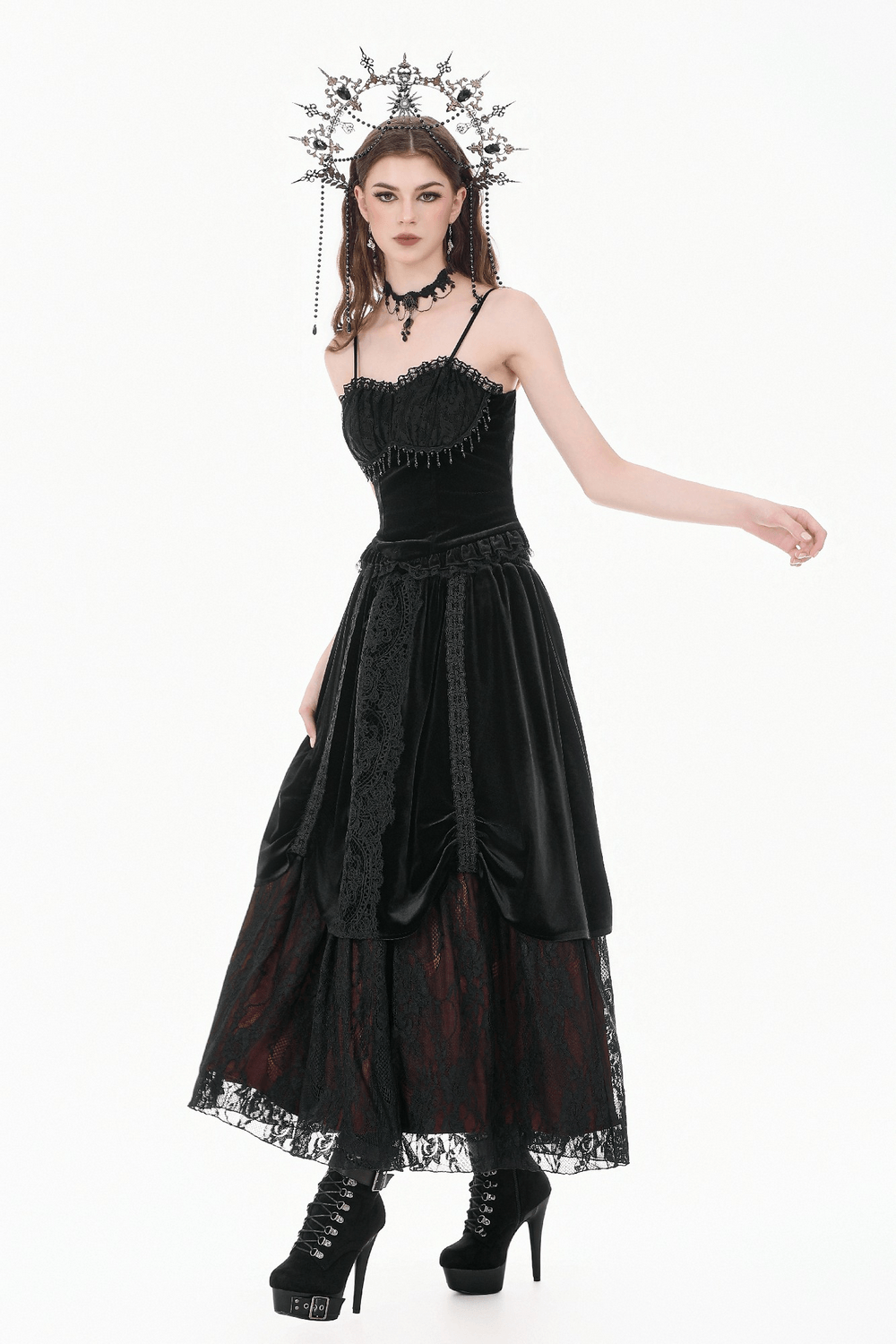 Gothic Velvet Maxi Skirt with Lace Overlay Panels showcased by model in stunning black attire and bold accessories.