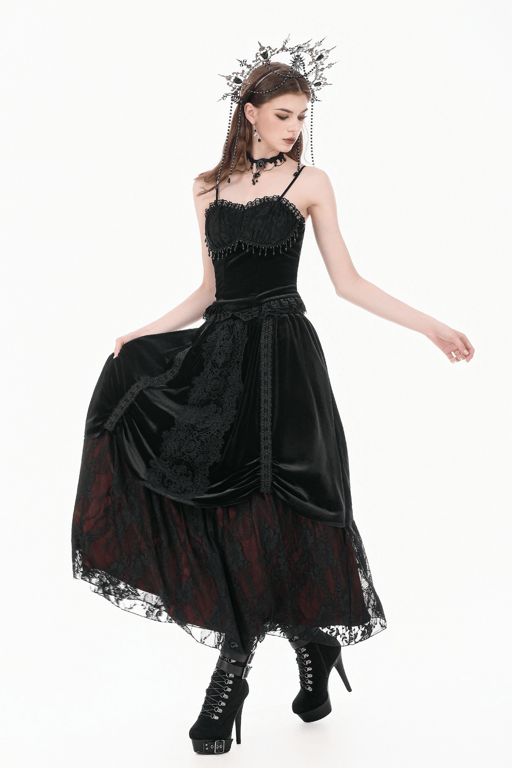 Gothic Velvet Maxi Skirt with Lace Overlay Panels worn by a model with a stylish headpiece and high heels.