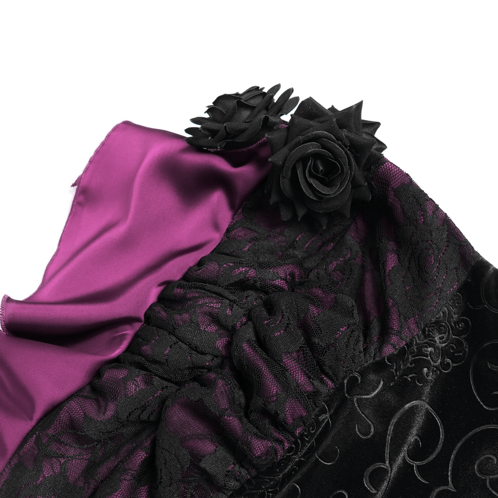 Close-up of black lace and purple satin on a gothic velvet maxi skirt with black rose embellishments.