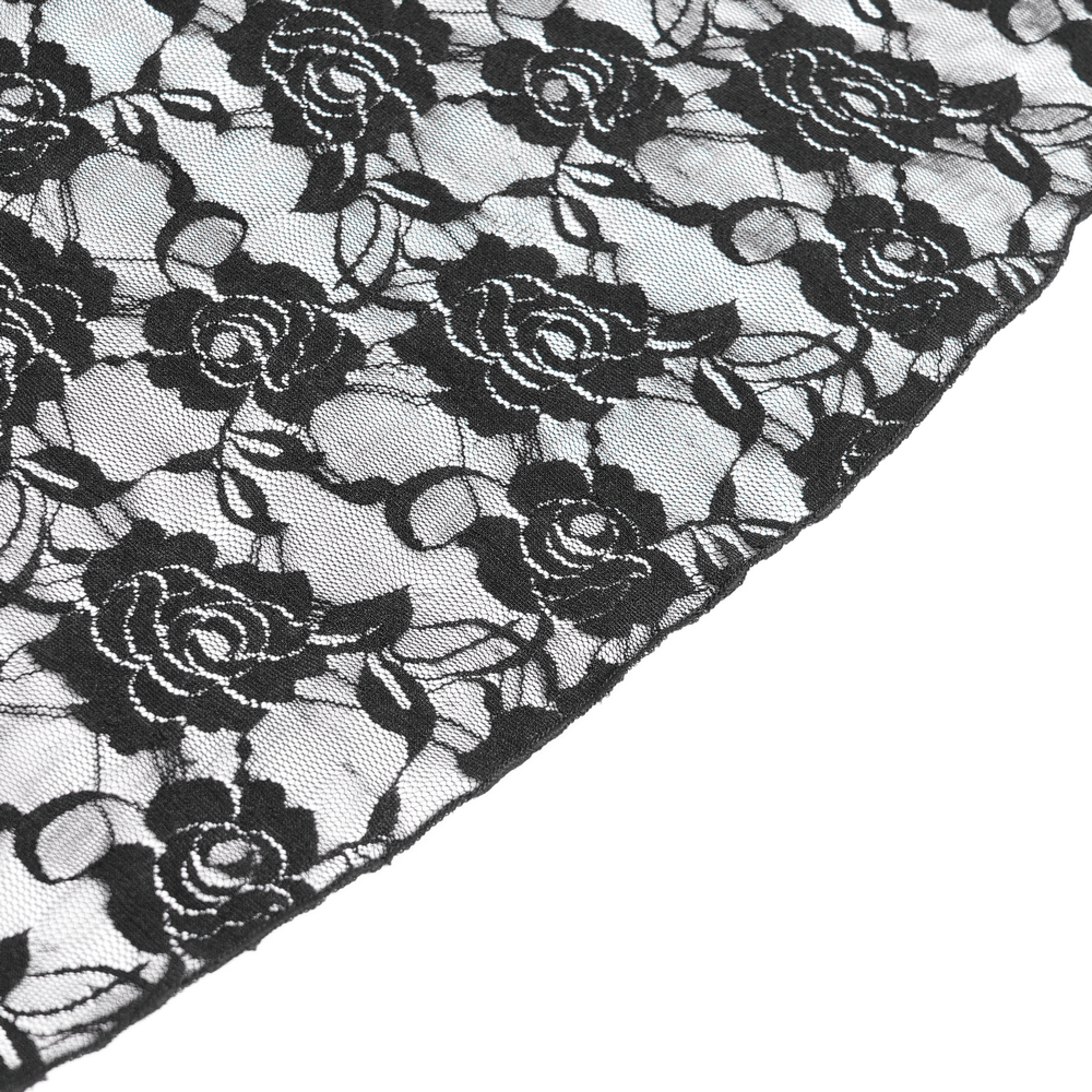 Close-up of intricate black lace with rose patterns, perfect for gothic fashion and Victorian-inspired designs.