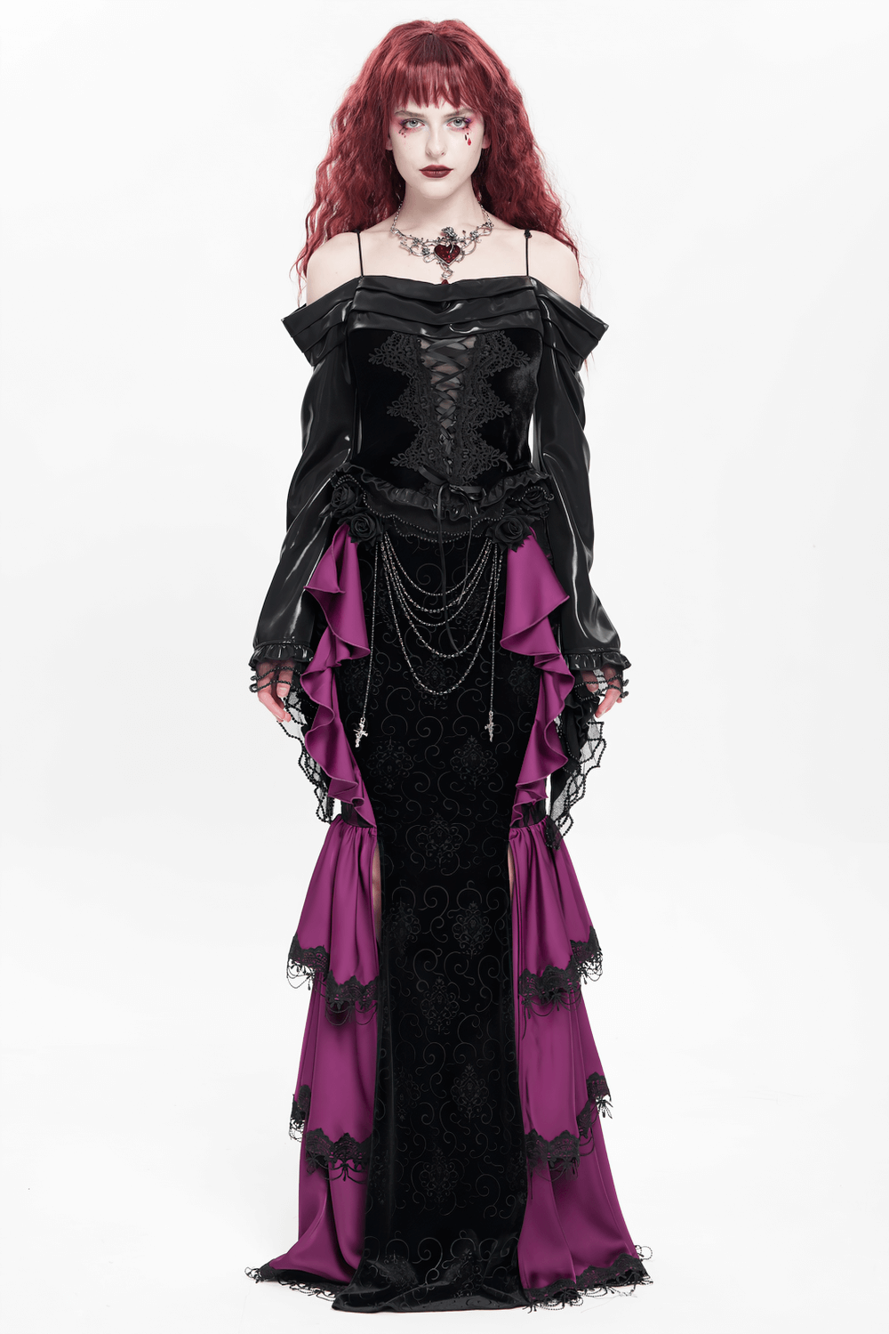 Gothic velvet maxi skirt with purple ruffles, lace roses, and chains for a dramatic Victorian look.