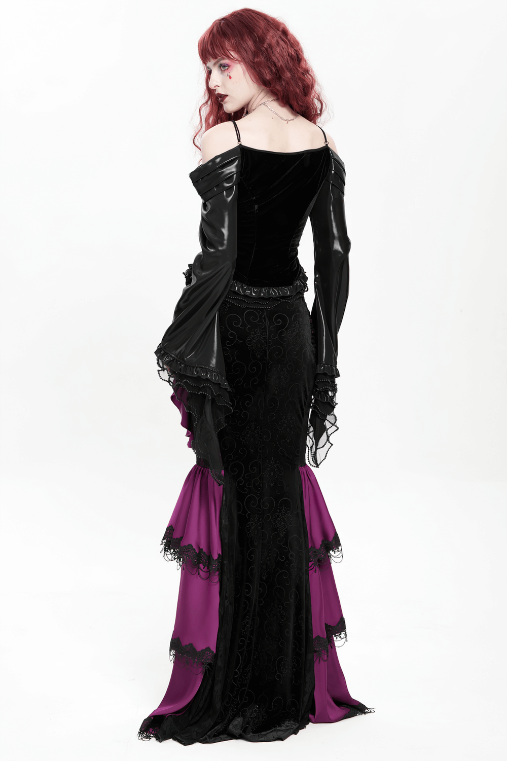 Gothic velvet maxi skirt with purple ruffles, lace details, and chains, perfect for alternative fashion and Victorian style.