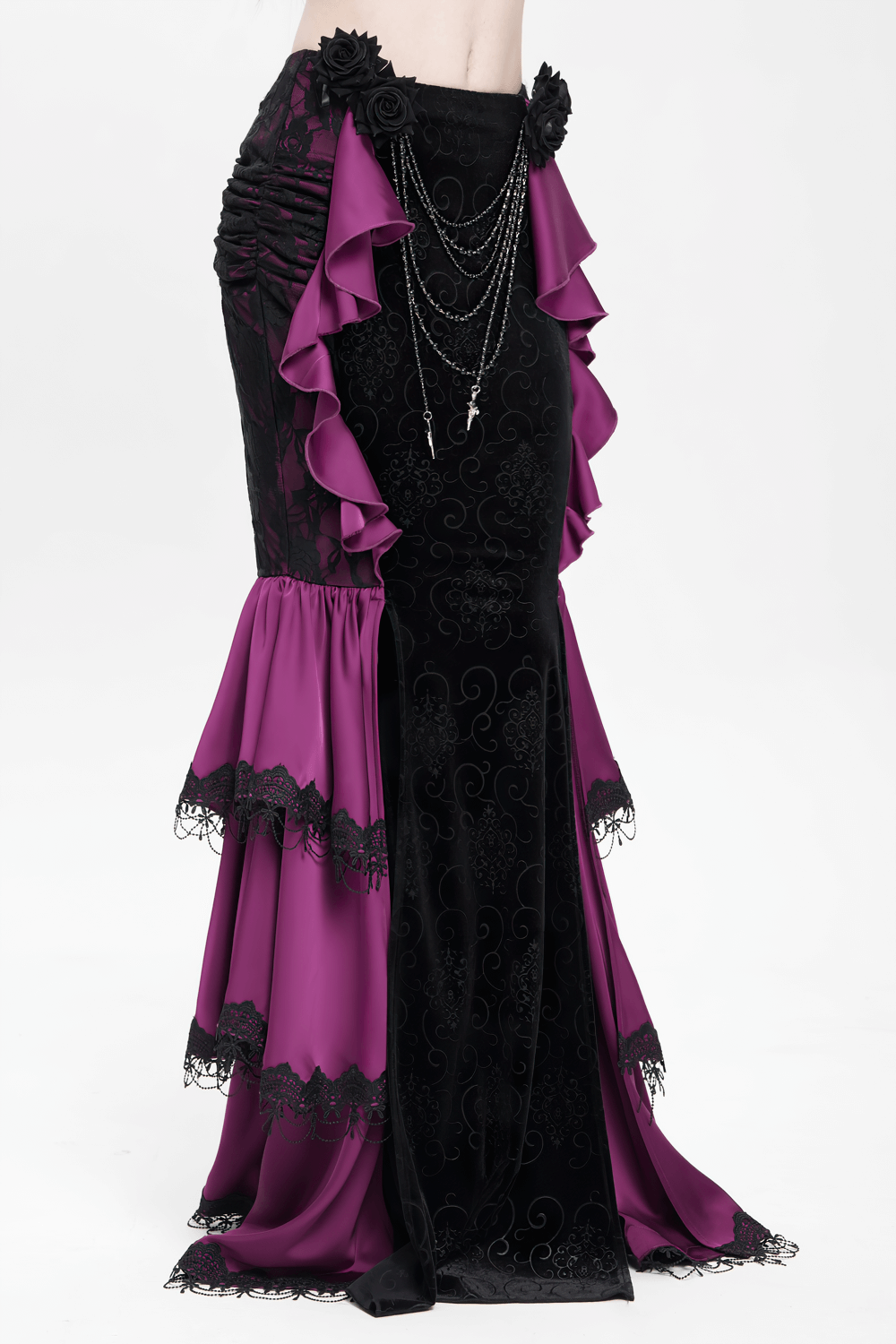 Gothic velvet maxi skirt with purple ruffles, lace roses, and chains for a dramatic Victorian look.