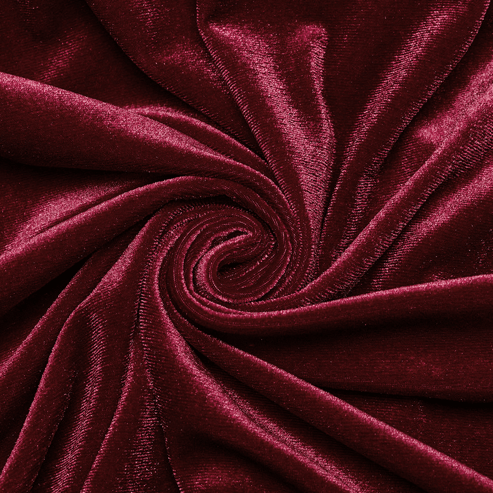 Close-up of rich burgundy velvet fabric showcasing its luxurious texture and elegance for Gothic fashion.