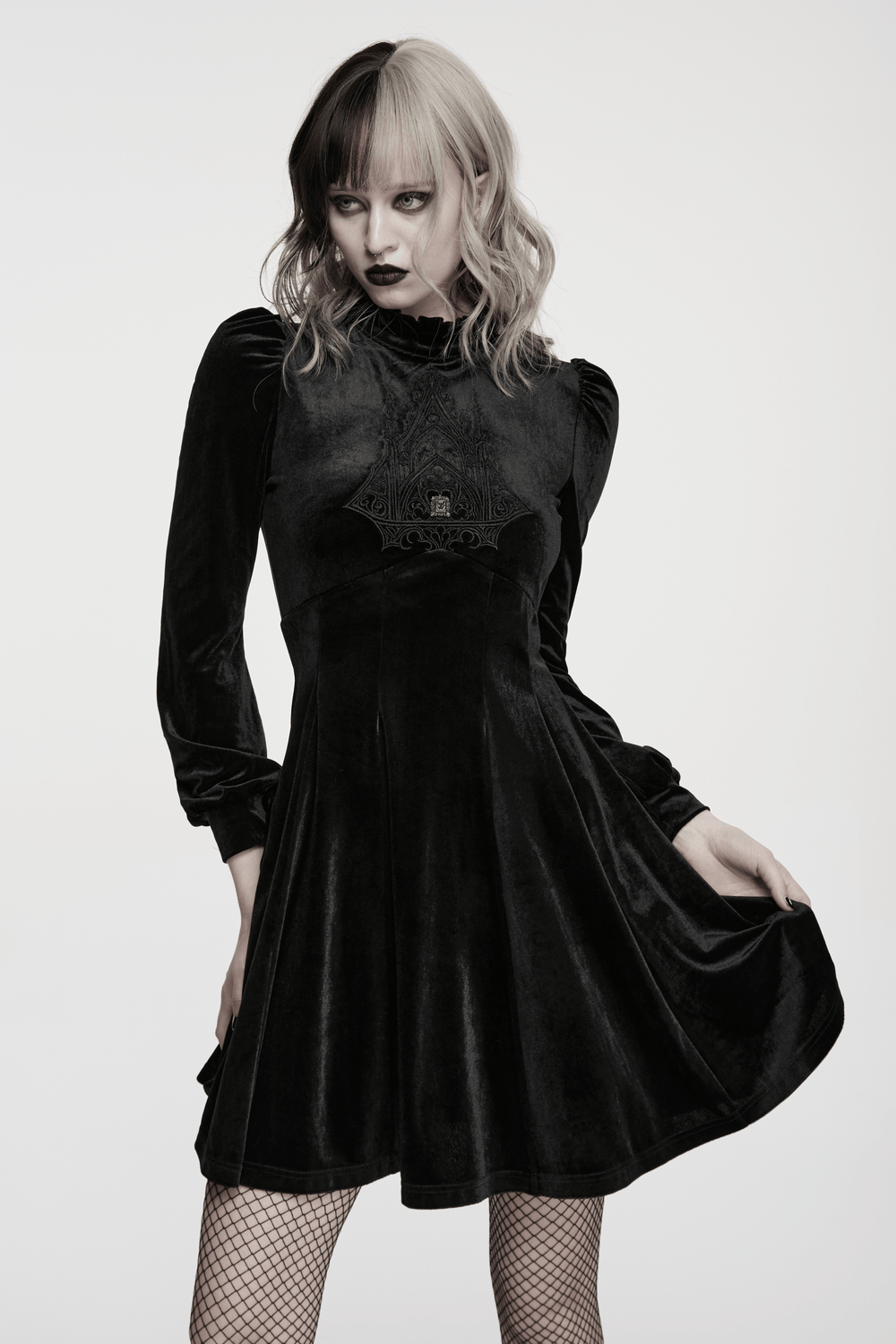 Gothic Velvet Mini Dress with Cathedral Embroidery worn by model showcasing stylish design and elegant velvet fabric.