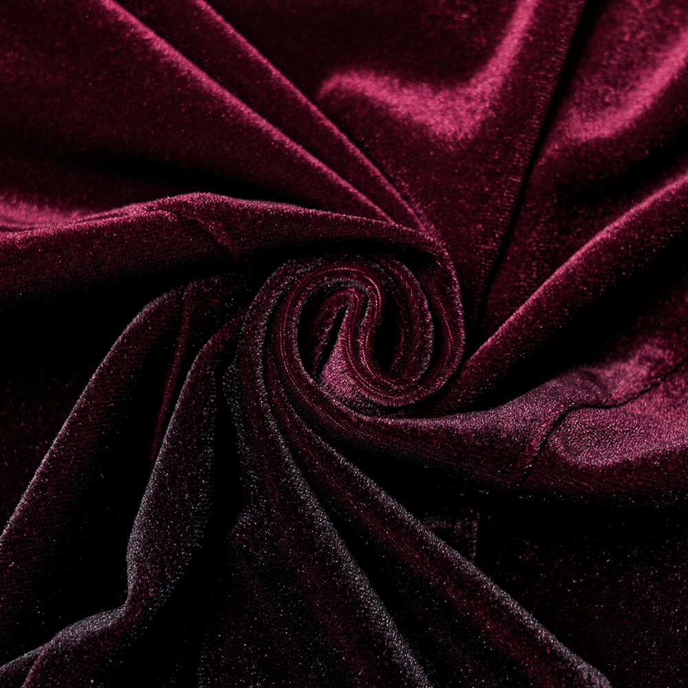 Luxurious burgundy velvet fabric showcasing rich texture, perfect for gothic fashion and elegant evening wear.