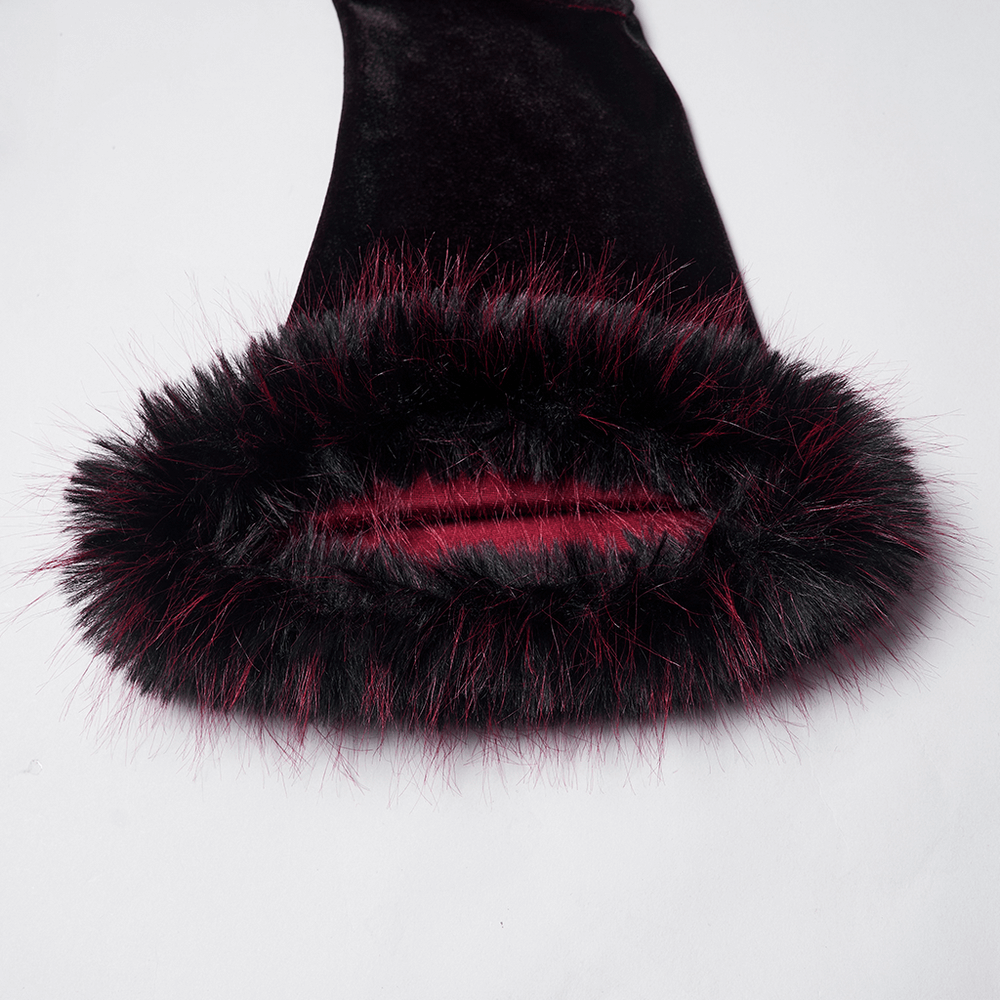 Close-up of gothic velvet dress sleeve featuring plush black and burgundy feather trim for added elegance.