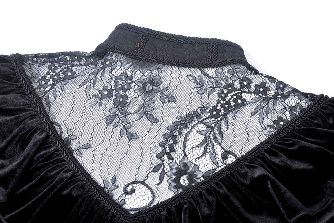 Close-up of Gothic velvet dress with intricate black lace collar and floral design, showcasing elegant Victorian style.