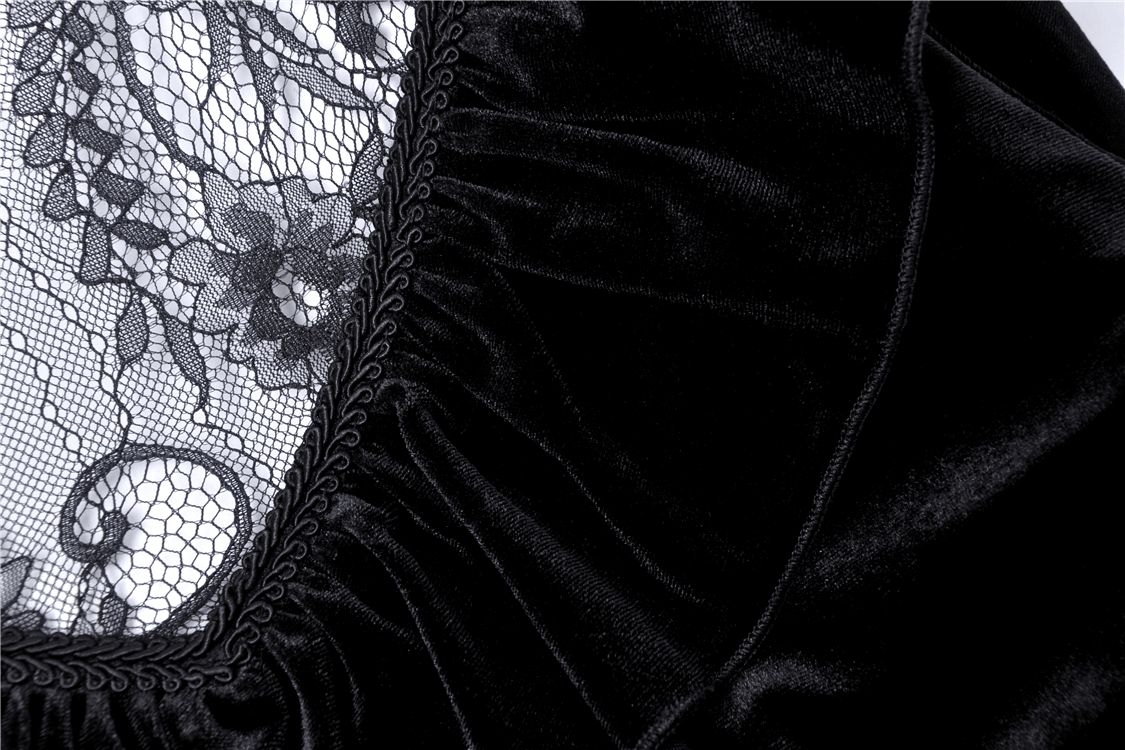 Close-up of black velvet fabric with intricate lace detailing, showcasing the romantic collar of a Gothic mini dress.