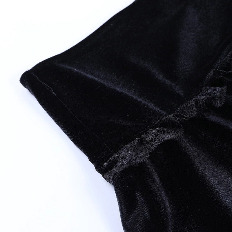 Close-up of black velvet ruffled fabric for high waist gothic mini skirt, highlighting lace details and plush texture.