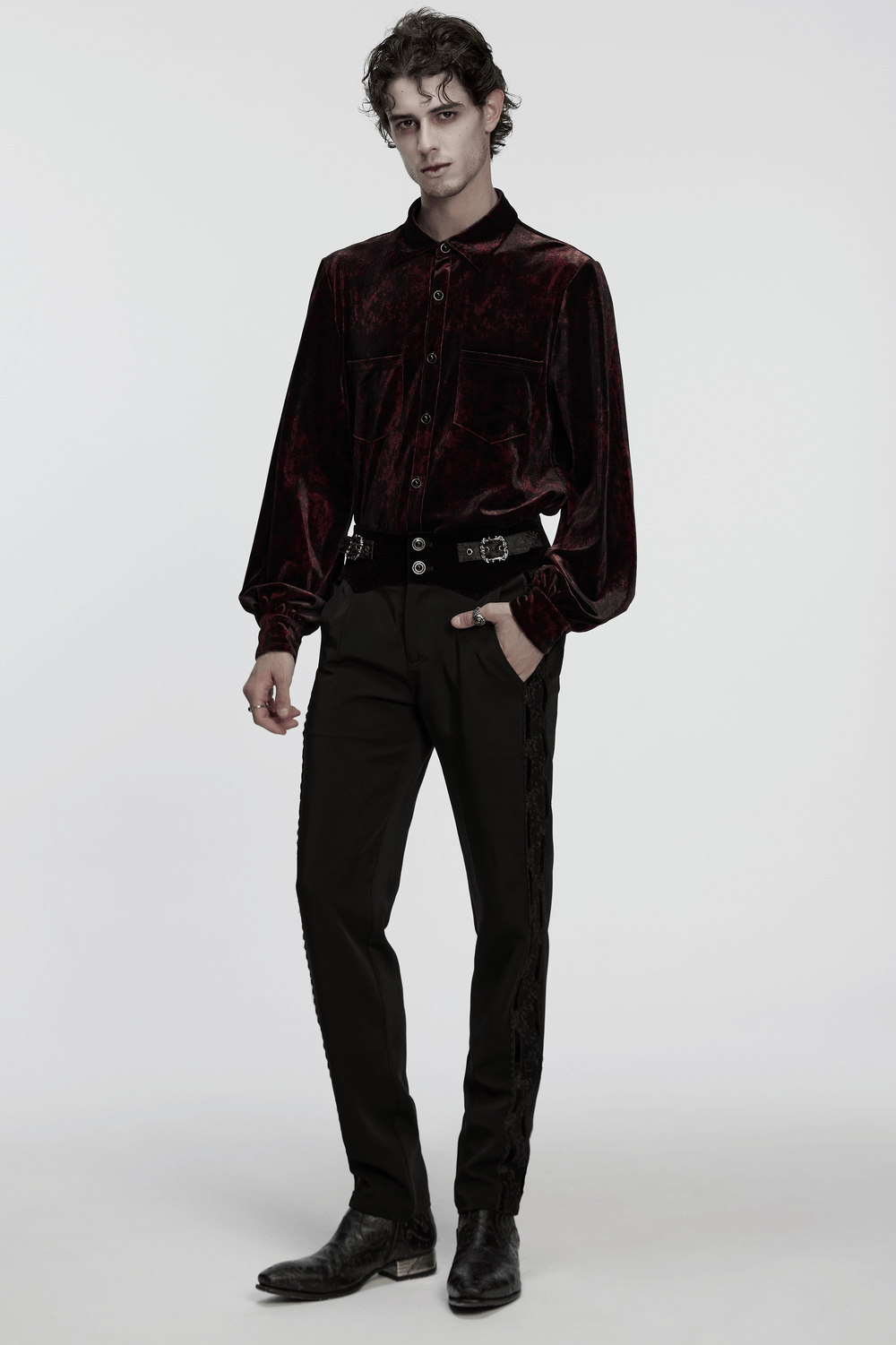 Gothic Velvet Shirt with Button Detail and Long Sleeves worn by model featuring dark red velvet fabric and stylish cuffs.