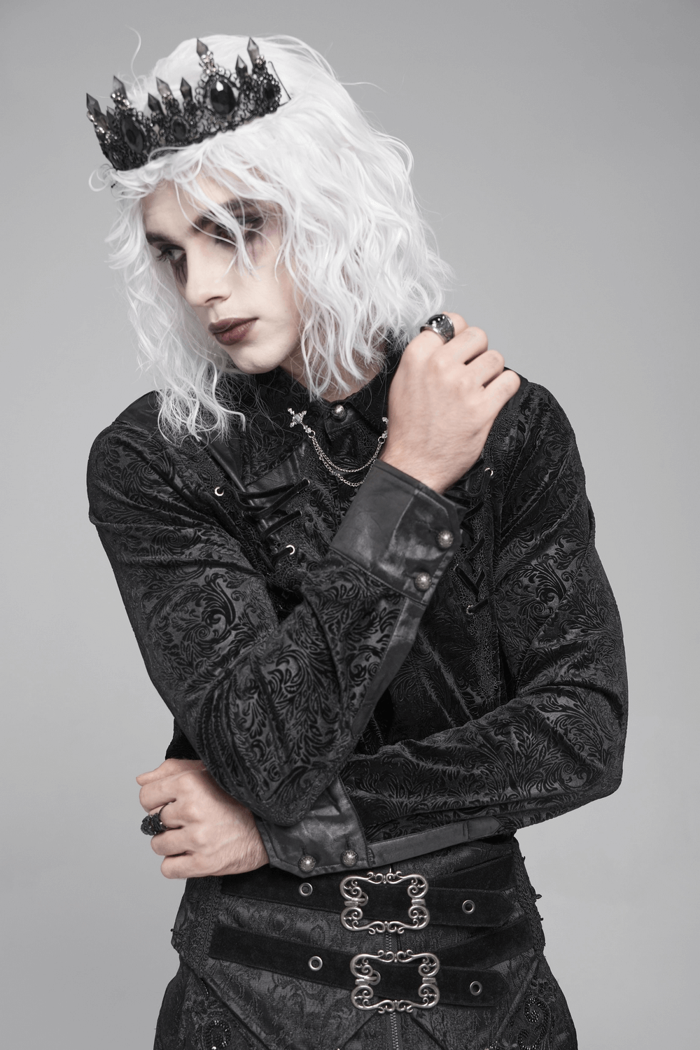 Gothic Velvet Shirt with Leather Trim and Lace-Up Detail worn by model with crown and frosty hair, creating a dark elegance.