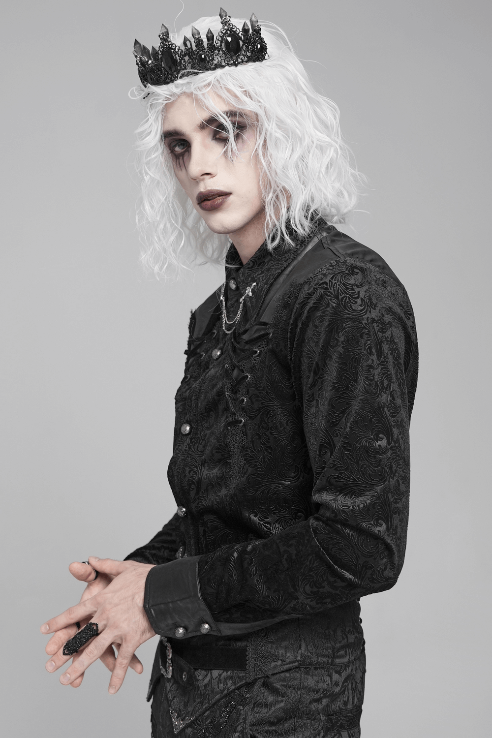 Gothic Velvet Shirt with Leather Trim and Lace-Up Detail worn by a model with a crown.