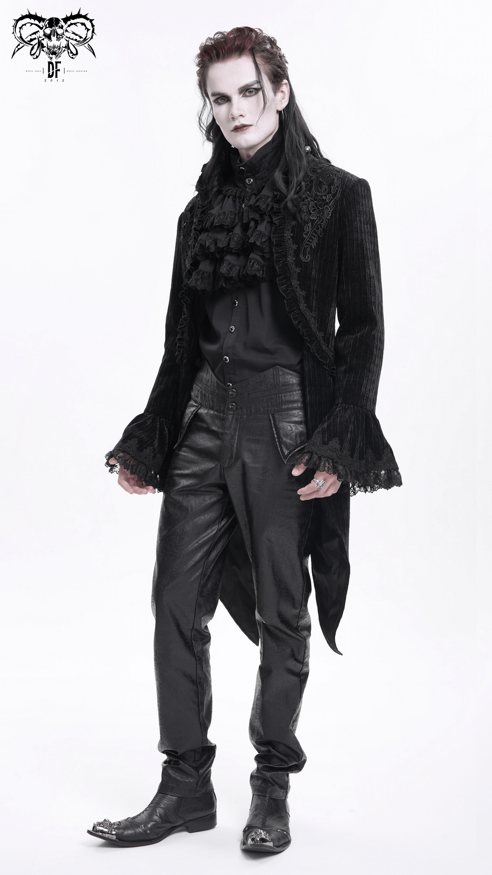 Gothic velvet swallowtail jacket with embroidered trim, showcasing a dramatic silhouette and intricate lace detailing.