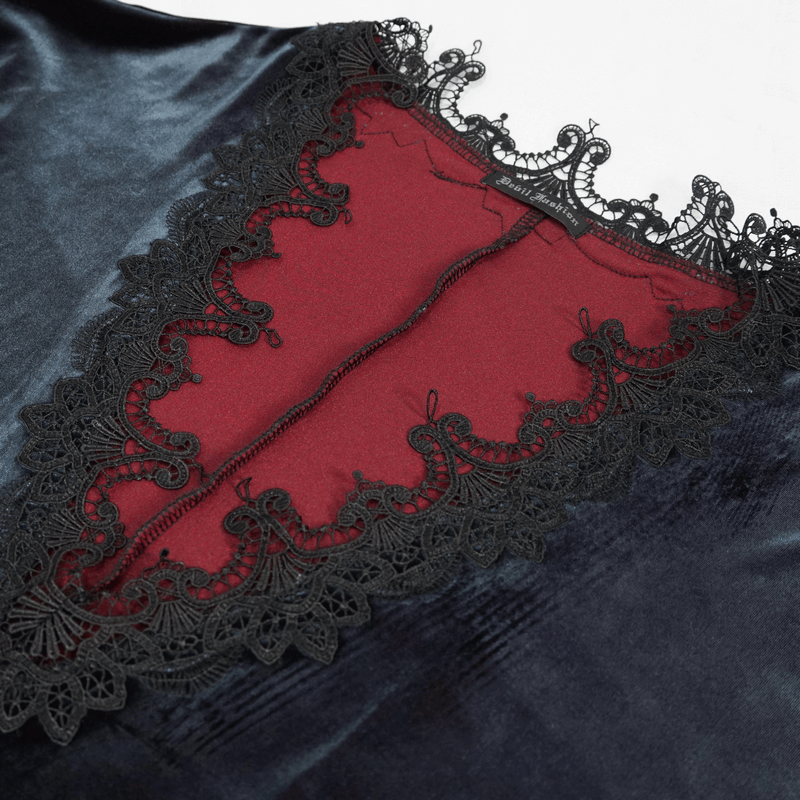 Close-up of gothic velvet dress showcasing intricate black lace applique and rich burgundy lining, embodying elegance.