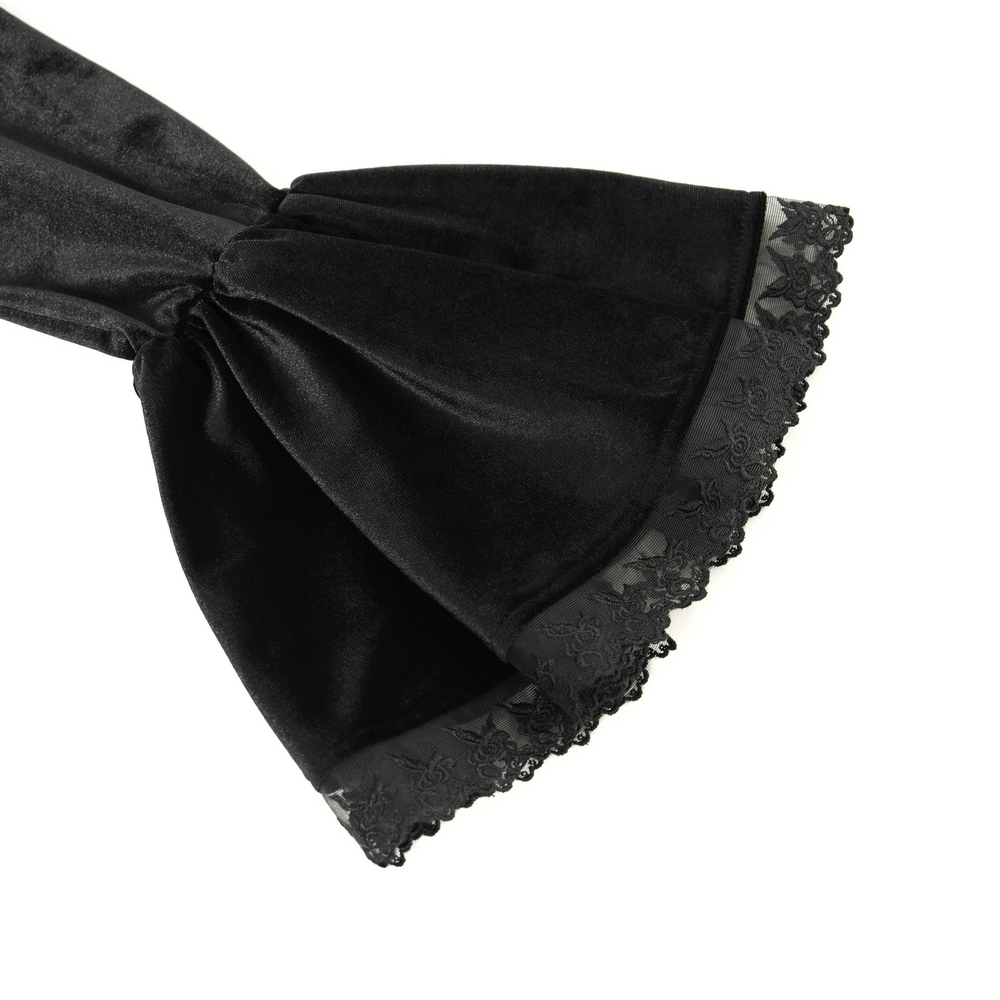 Elegant black velvet blouse sleeve with lace trim, showcasing Gothic Victorian-inspired fashion details.