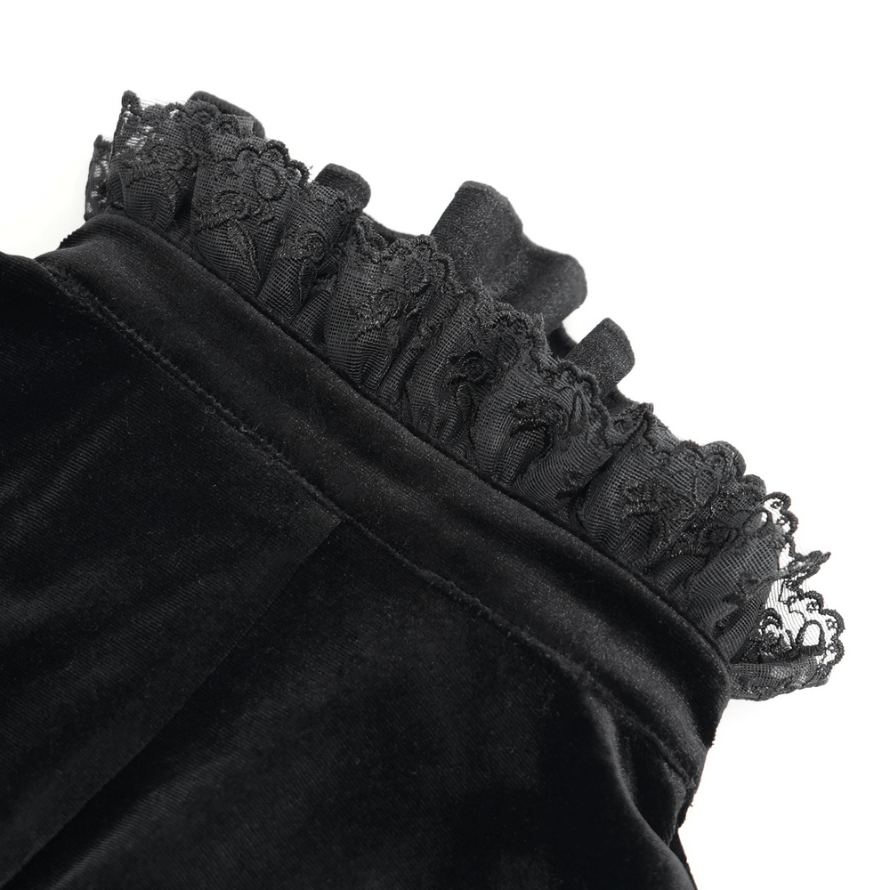 Close-up of ruffled collar with lace trim on a Gothic Victorian black velvet blouse.