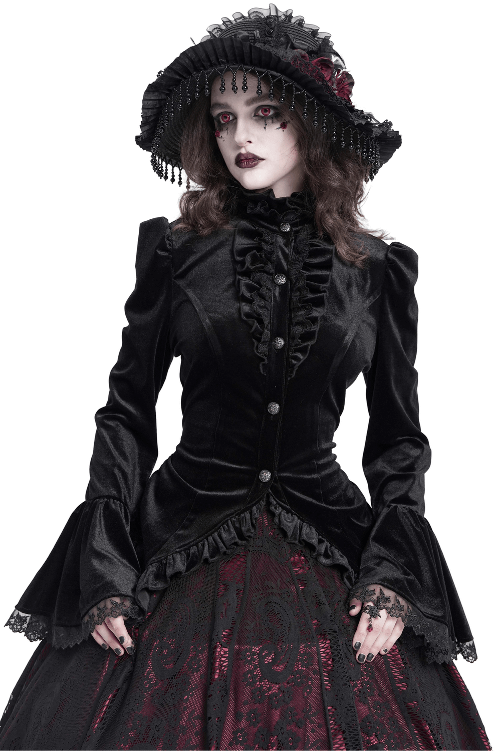 Gothic Victorian black velvet blouse with ruffles and lace details, styled elegantly with a dramatic hat.