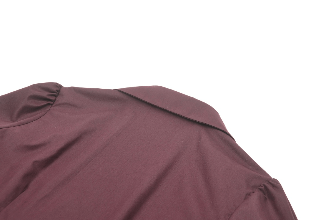 Close-up of the Gothic Victorian Burgundy blouse showcasing the elegant ruffled collar and rich fabric texture.