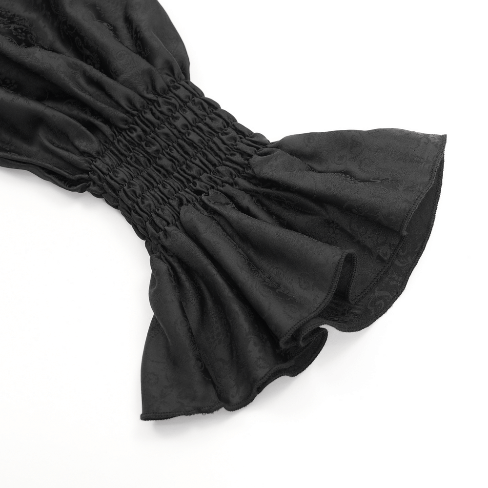 Elegant black ruffled sleeve detail of a gothic Victorian high neck shirt for men.