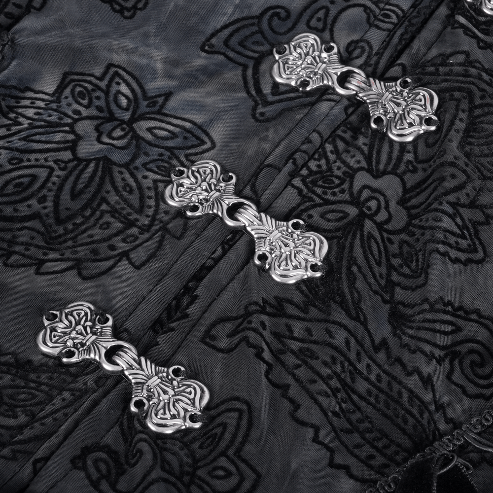 Close-up of ornate silver buttons and intricate lace detailing on a Gothic Victorian hooded lace cape.