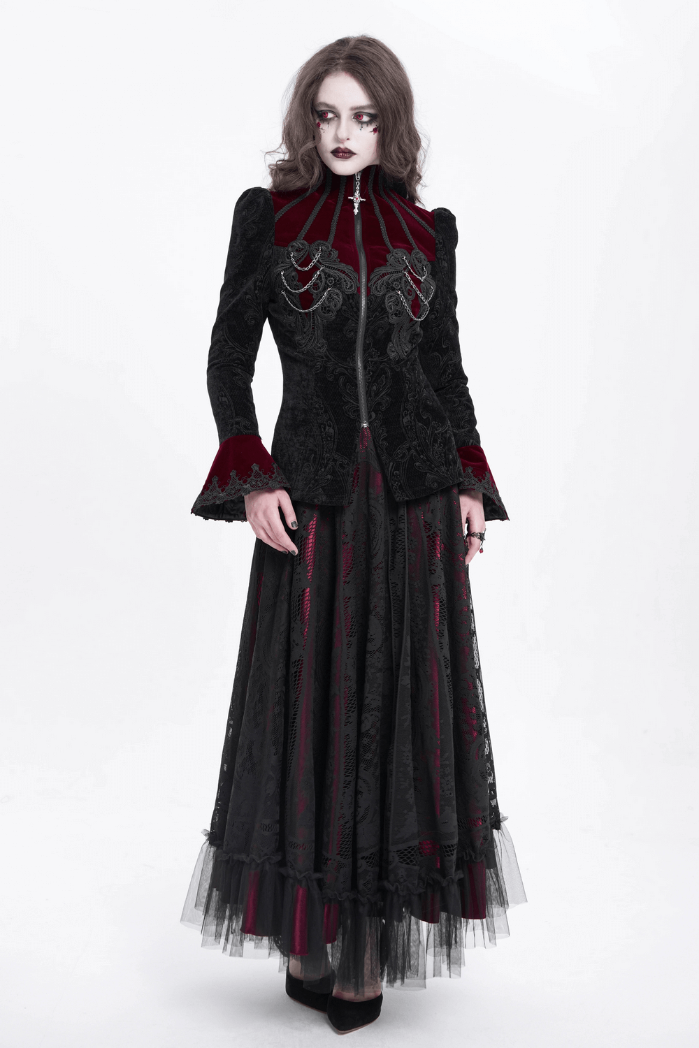 Gothic Victorian jacket with chains, bell sleeves, and lace trim, styled in steampunk elegance, worn by a model.