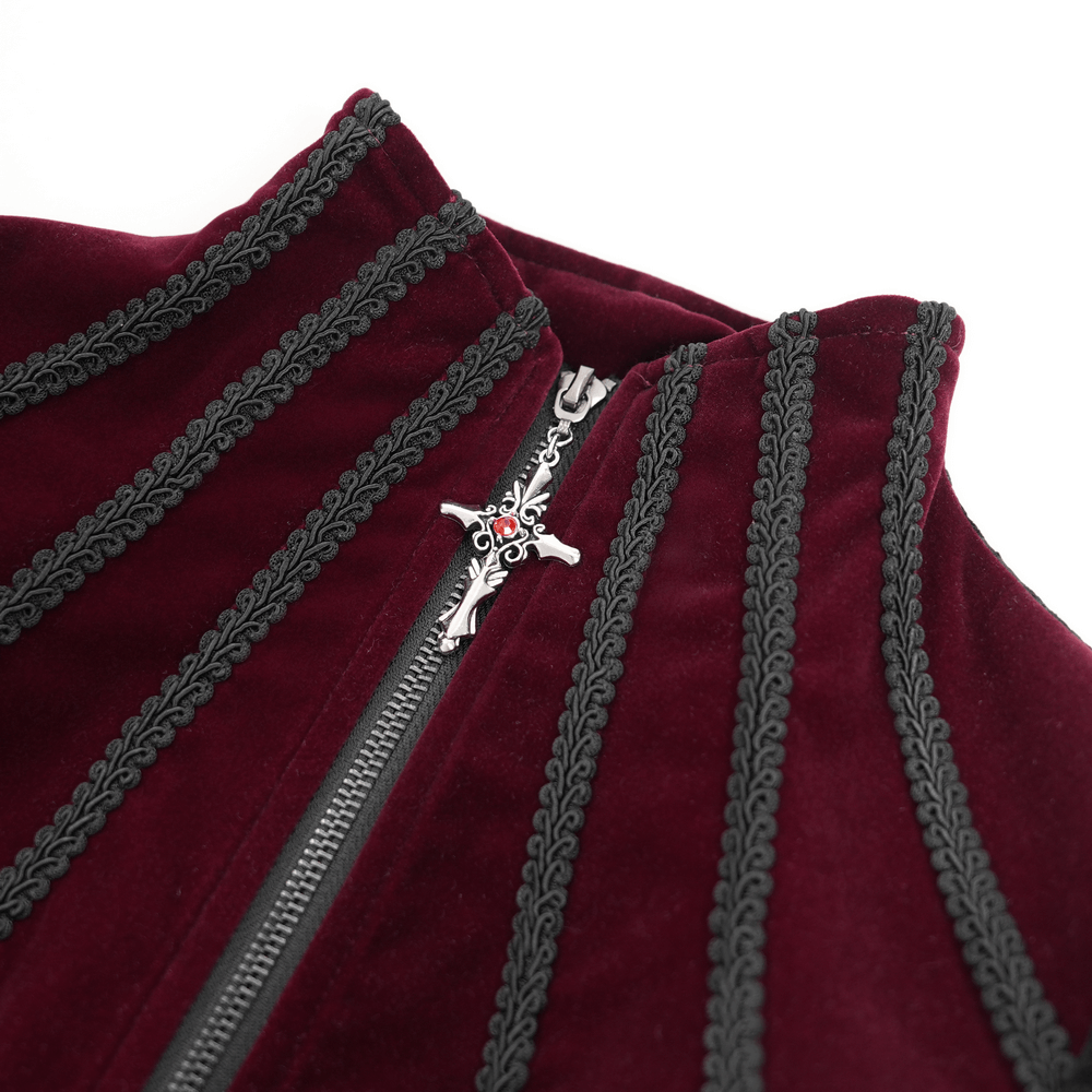 Close-up of a gothic Victorian jacket in burgundy with intricate black trim and a decorative zipper.